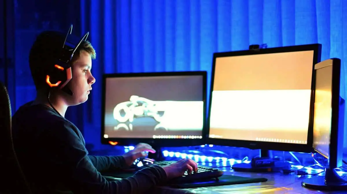 Child playing game technology | The Ultimate Guide To PC Games